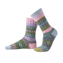 Load image into Gallery viewer, Solmate socks are warm comfy socks made from mainly recycled cotton textiles. This colour is called Lilac and is a mix of pale tones of pink, light blue and green.
