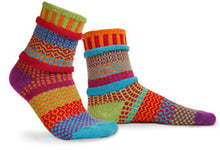 Load image into Gallery viewer, Solmate socks made from mainly recycled cotton textiles. This colour is called Cosmos and is a lovely mix of bright orange, red, lime and turquoise.
