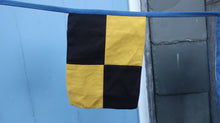 Load image into Gallery viewer, View of an individual signal flag in yellow and black squares
