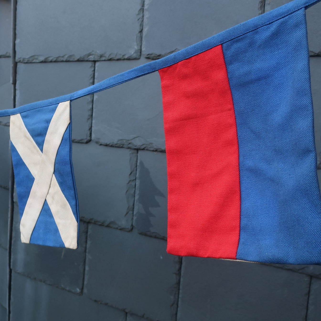 Reverse side of the welcome bunting showing the nautical signal flag