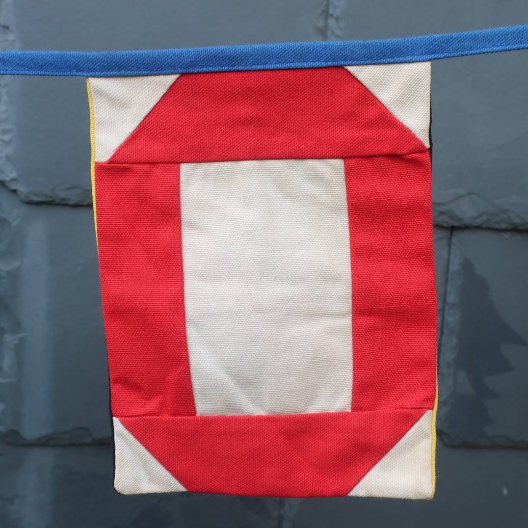 Flag showing the letter O from the Welcome bunting