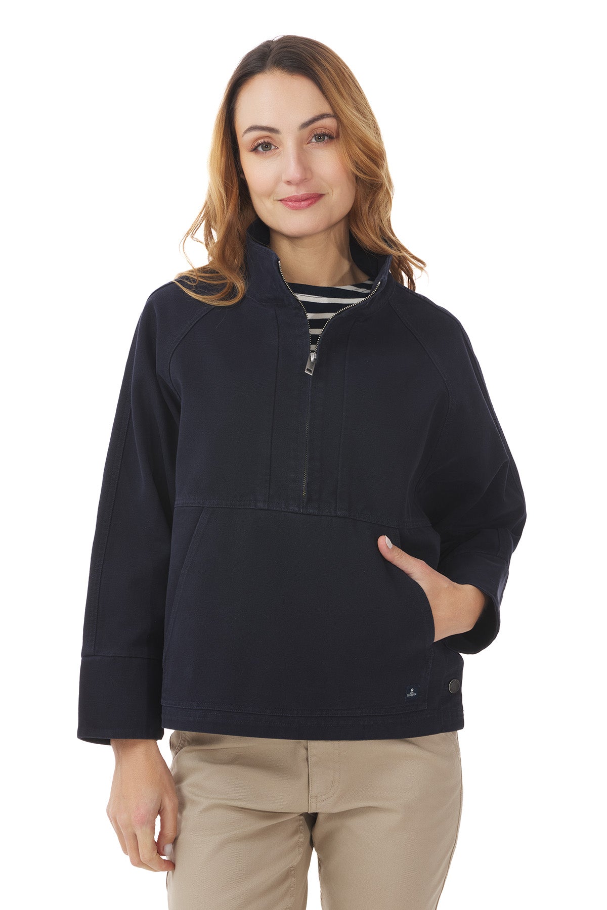 Image of a woman wearing the Mousqueton Yelli smock style top in classic dark navy canvas.