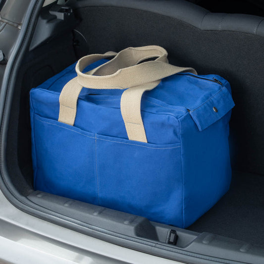 Cobb Canvas Cabin bag shown in blue. Ideal as a weekend or overnight travel bag.